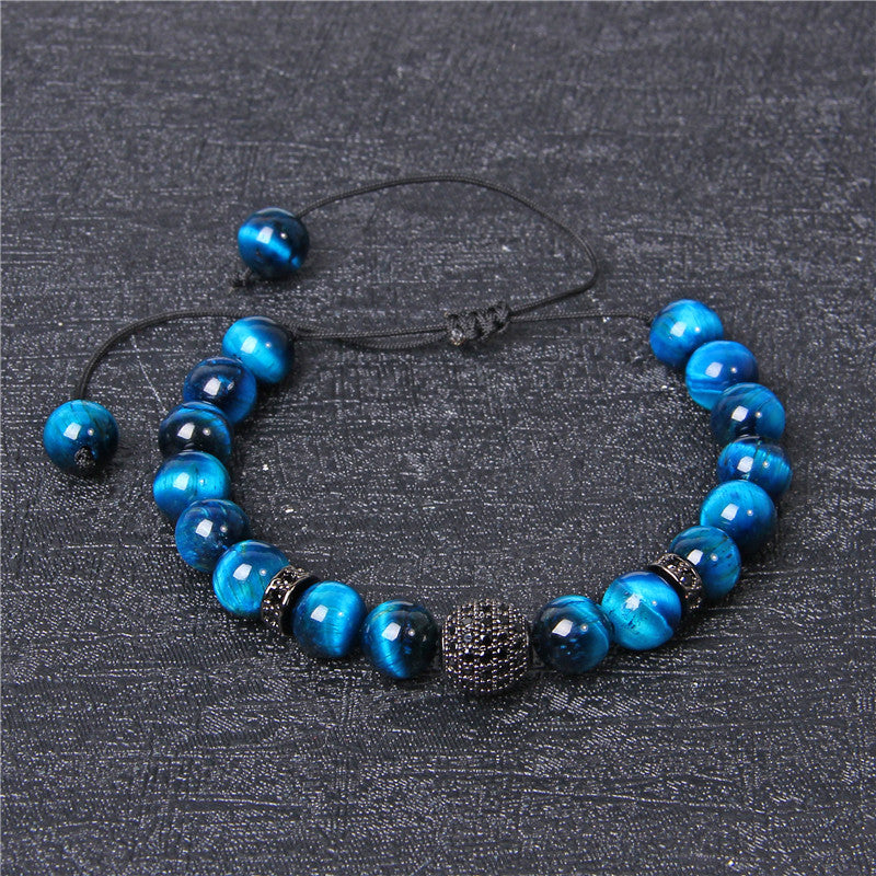 Blue Tigers Eye stone with zicron center